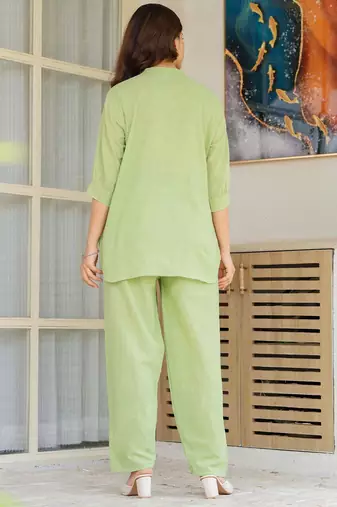 Womens green self design cotton fabric kurtis 3/4 sleeves mandarin collar
