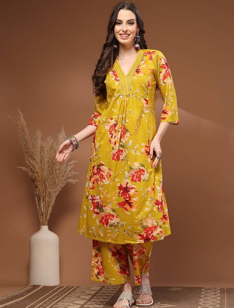 Womens yellow self design cotton fabric kurta set 3/4 sleeves v-neck