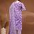 Womens purple self design cotton fabric kurta set 3/4 sleeves round neck