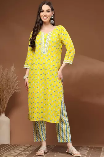 Womens yellow self design cotton fabric kurta set 3/4 sleeves round neck