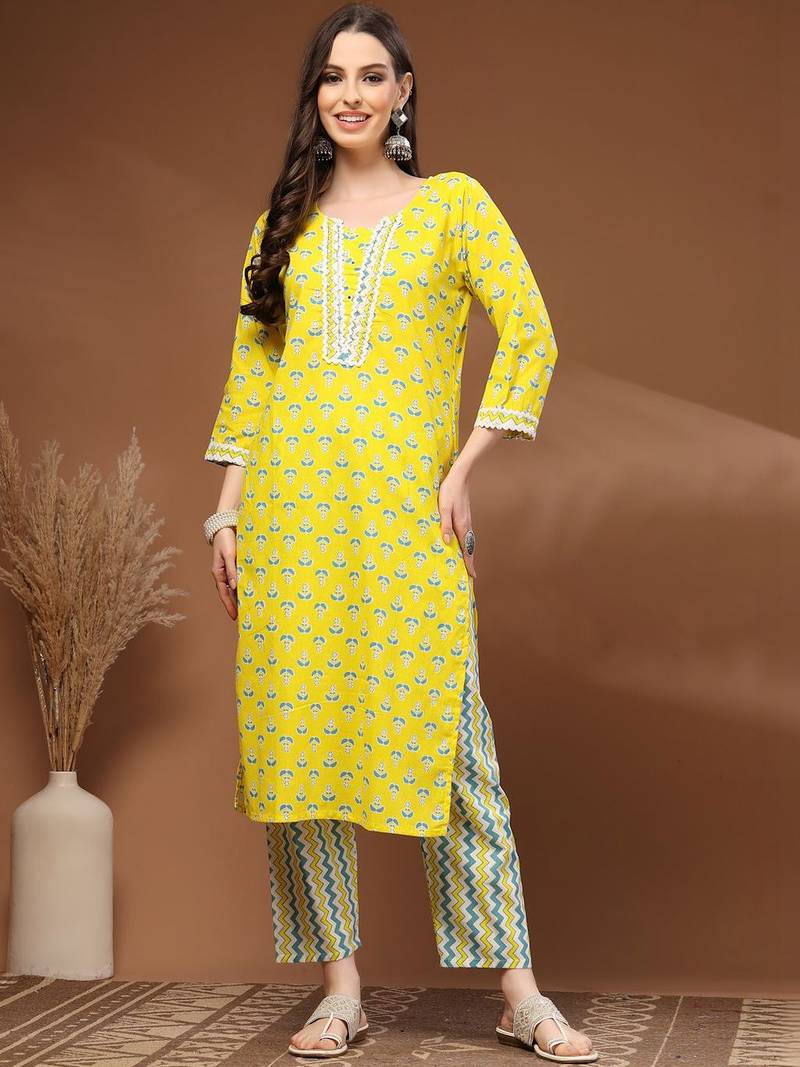 Womens yellow self design cotton fabric kurta set 3/4 sleeves round neck