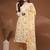 Womens off white self design cotton fabric kurta set 3/4 sleeves round neck