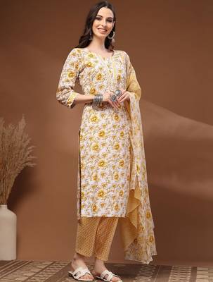 Womens off white self design cotton fabric kurta set 3/4 sleeves round neck 3