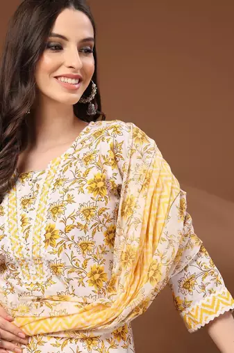 Womens off white self design cotton fabric kurta set 3/4 sleeves round neck
