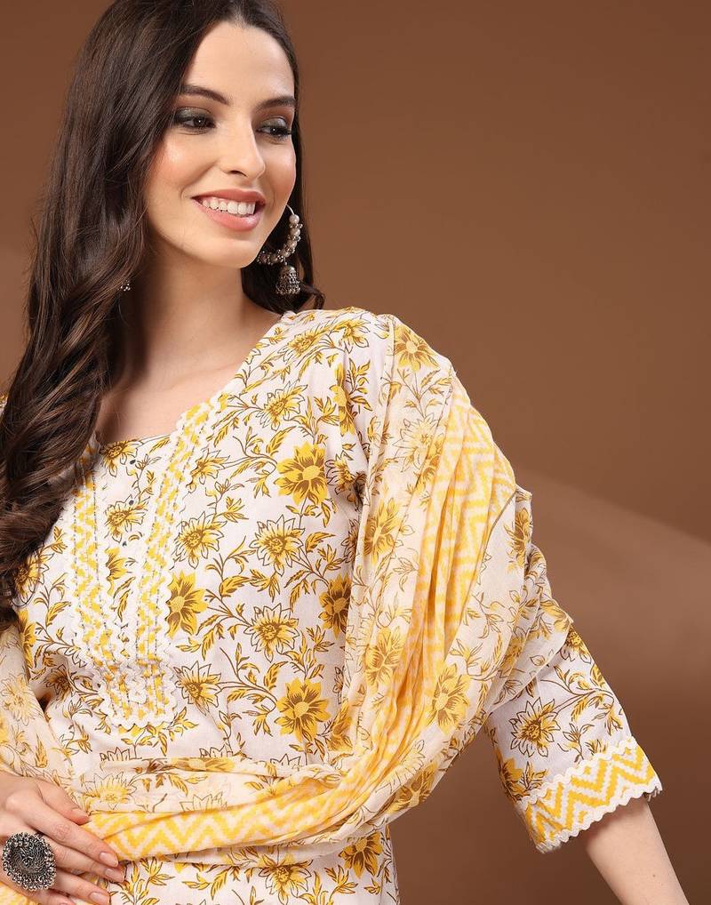 Womens off white self design cotton fabric kurta set 3/4 sleeves round neck