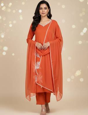 Womens orange self design cotton fabric kurta set 3/4 sleeves round neck 1