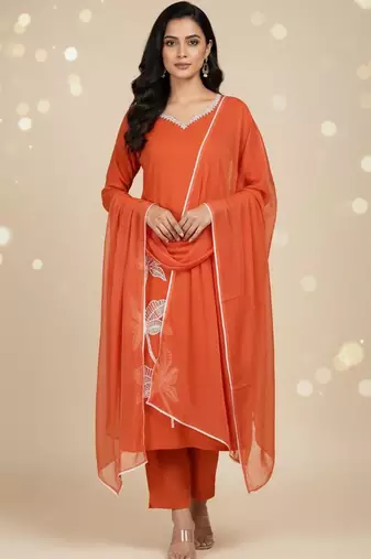 Womens orange self design cotton fabric kurta set 3/4 sleeves round neck