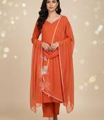 Womens orange self design cotton fabric kurta set 3/4 sleeves round neck