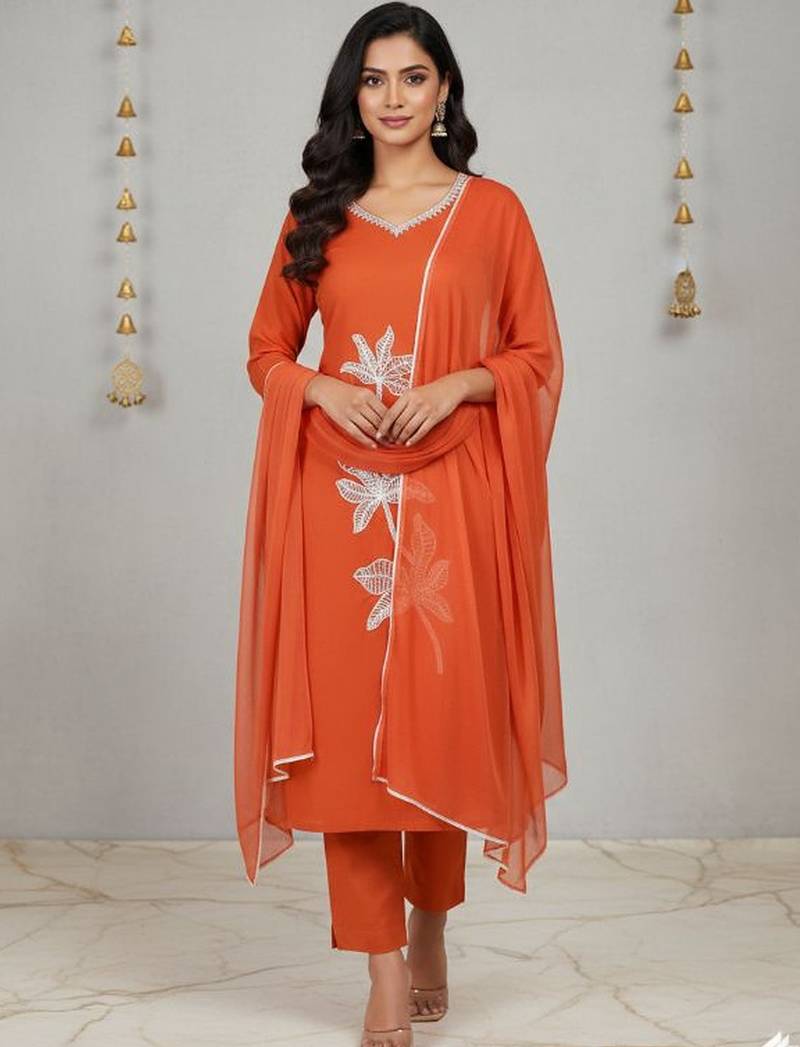 Womens orange self design cotton fabric kurta set 3/4 sleeves round neck