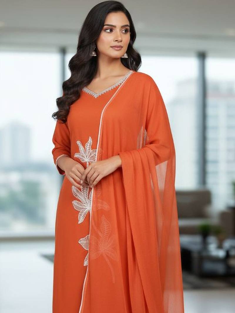 Womens orange self design cotton fabric kurta set 3/4 sleeves round neck
