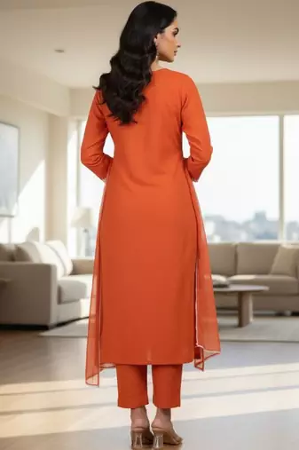 Womens orange self design cotton fabric kurta set 3/4 sleeves round neck