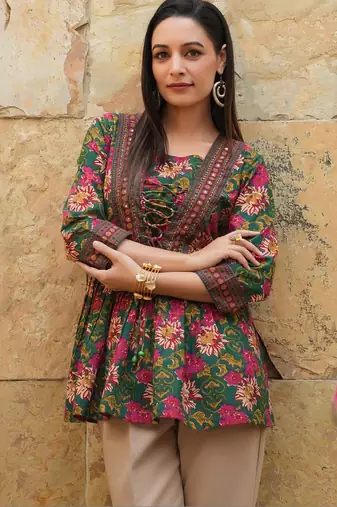 Womens green self design cotton fabric kurtis 3/4 sleeves boat neck