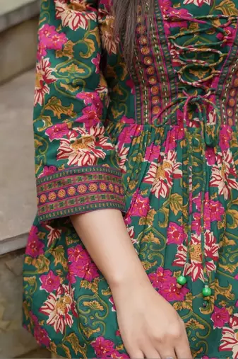 Womens green self design cotton fabric kurtis 3/4 sleeves boat neck