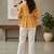 Womens yellow self design cotton fabric kurtis 3/4 sleeves v-neck