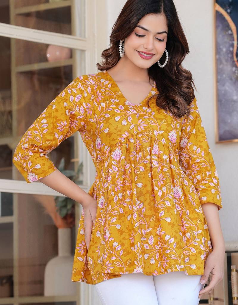 Womens yellow self design cotton fabric kurtis 3/4 sleeves v-neck