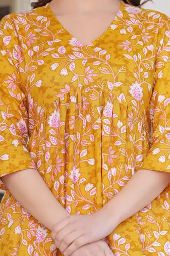 Womens yellow self design cotton fabric kurtis 3/4 sleeves v-neck