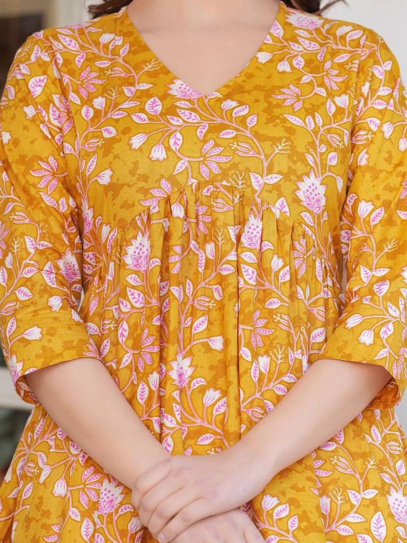 Womens yellow self design cotton fabric kurtis 3/4 sleeves v-neck