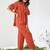Orange ruffle top and pants co-ord set