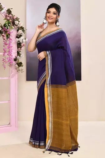 Women's purple embellished cotton blend jamdani saree