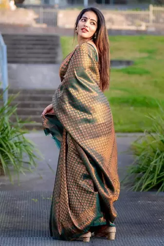 Green silk blend banarasi saree with unstitched blouse piece