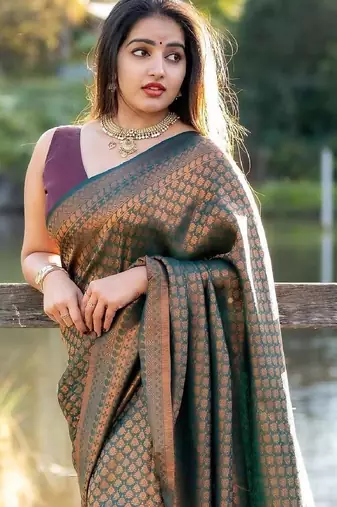 Green silk blend banarasi saree with unstitched blouse piece