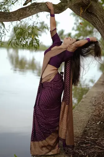 Purple silk blend banarasi saree with unstitched blouse piece