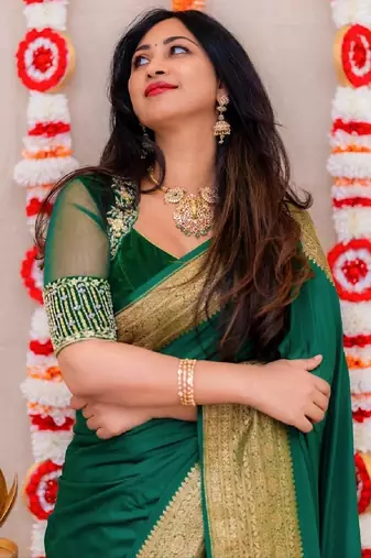 Bottle green silk blend banarasi saree with unstitched blouse piece