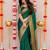 Bottle green soft silk blend banarasi jacuard work designer party wear saree with unstitched blouse piece