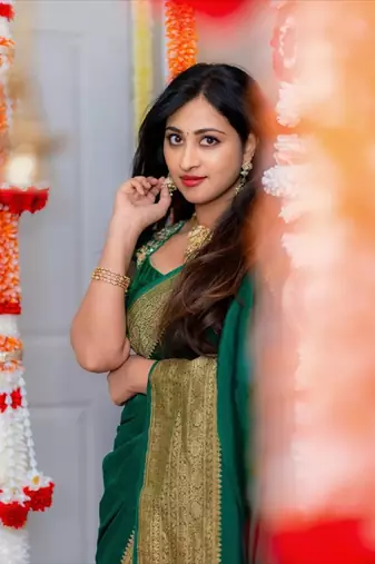 Bottle green silk blend banarasi saree with unstitched blouse piece
