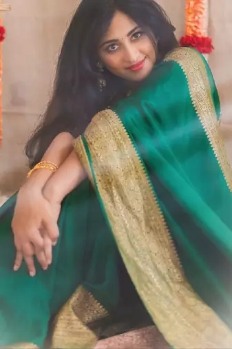 Bottle green silk blend banarasi saree with unstitched blouse piece