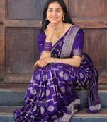 Purple silk blend banarasi saree with unstitched blouse piece