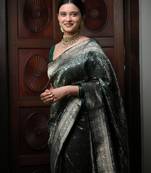 Green silk blend banarasi saree with unstitched blouse piece