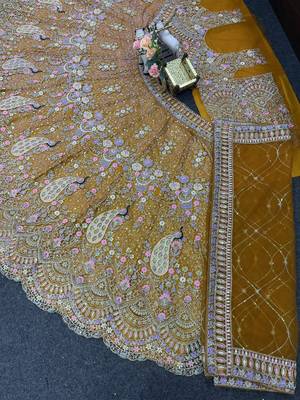 YELLOW EMBOIDERY lehenga CHOLI 5