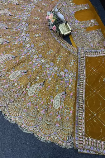 YELLOW EMBOIDERY lehenga CHOLI