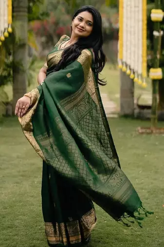 Green silk blend banarasi saree with unstitched blouse piece