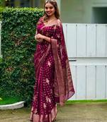 Dark pink silk blend banarasi saree with unstitched blouse piece