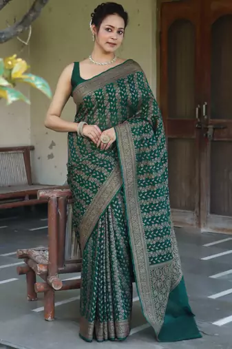 Green silk blend banarasi saree with unstitched blouse piece