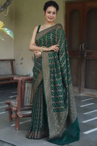 Green silk blend banarasi saree with unstitched blouse piece