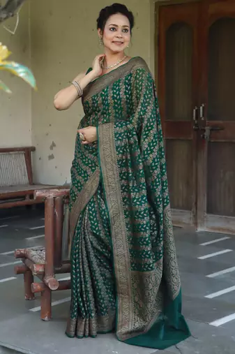 Green silk blend banarasi saree with unstitched blouse piece