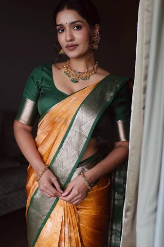 Yellow green silk blend banarasi saree with unstitched blouse piece