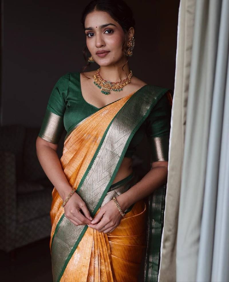 Yellow green silk blend banarasi saree with unstitched blouse piece