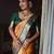 Yellow green silk blend banarasi saree with unstitched blouse piece
