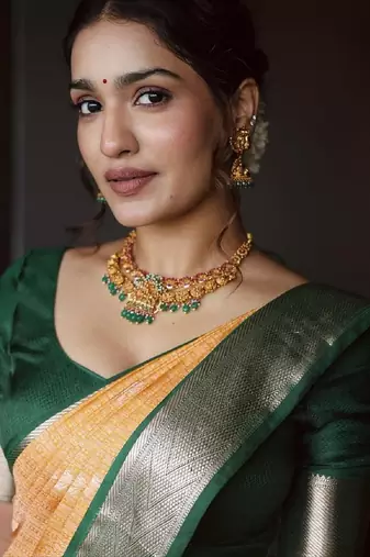 Yellow green silk blend banarasi saree with unstitched blouse piece