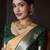 Yellow green silk blend banarasi saree with unstitched blouse piece