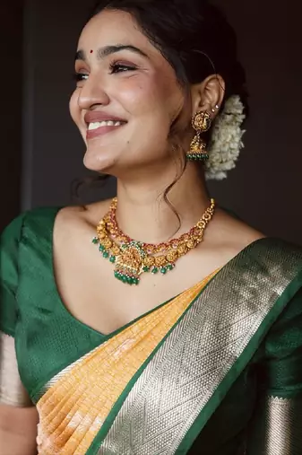 Yellow green silk blend banarasi saree with unstitched blouse piece