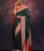 Green silk blend banarasi saree with unstitched blouse piece