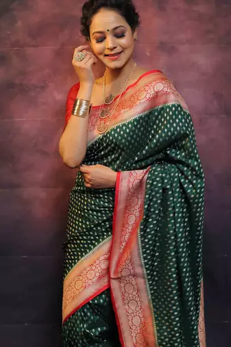 Green silk blend banarasi saree with unstitched blouse piece