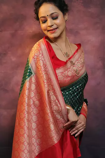 Green silk blend banarasi saree with unstitched blouse piece