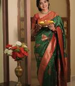 Green silk blend banarasi saree with unstitched blouse piece