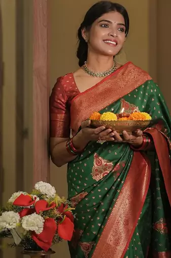 Green silk blend banarasi saree with unstitched blouse piece